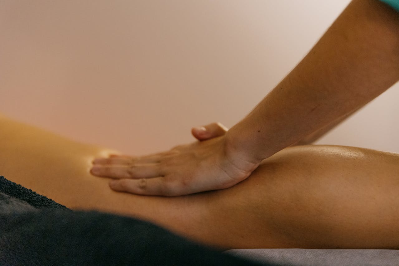 Close-up of a hand giving a relaxing therapeutic massage, highlighting well-being.